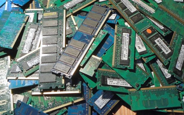 A pile of used laptop and desktop RAM memory modules