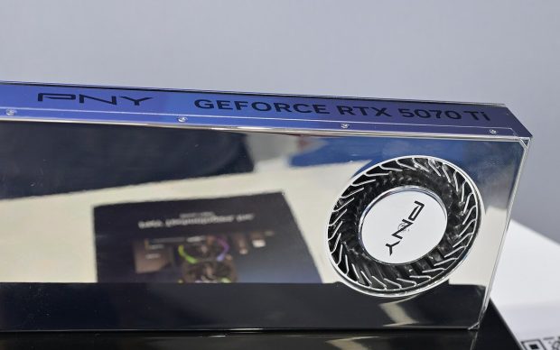 A PNY GeForce RTX 5070 Ti graphics card on a display stand