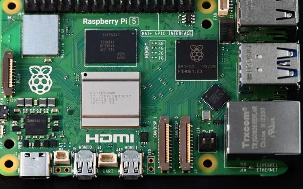 Raspberry Pi 5 single board computer on a white background